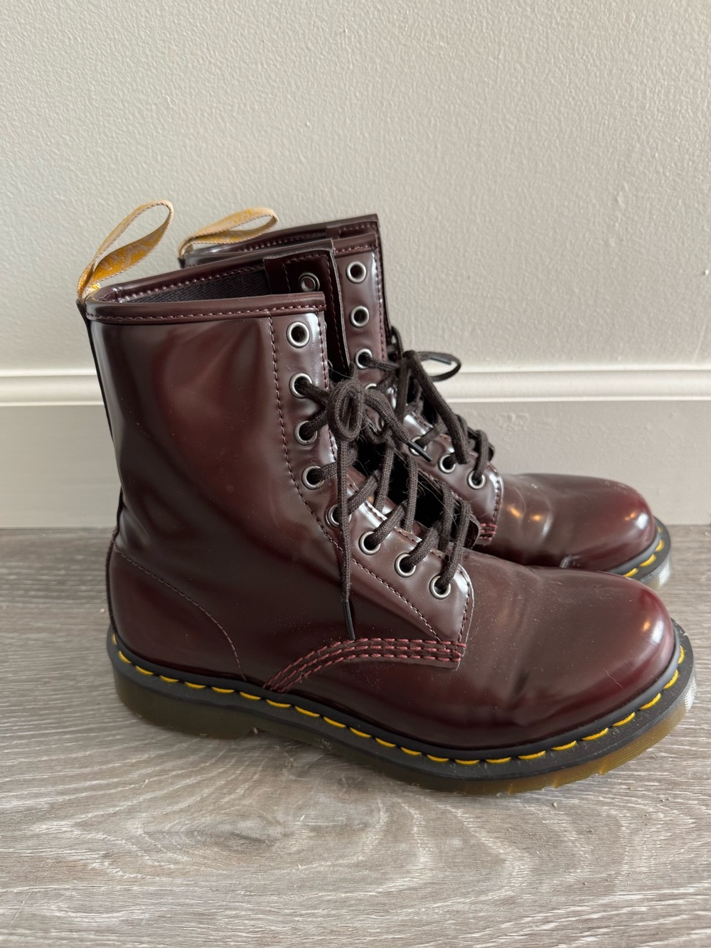 Dr. Martens Glossy Burgundy Lace-Up Boots with Yellow Pull Tabs